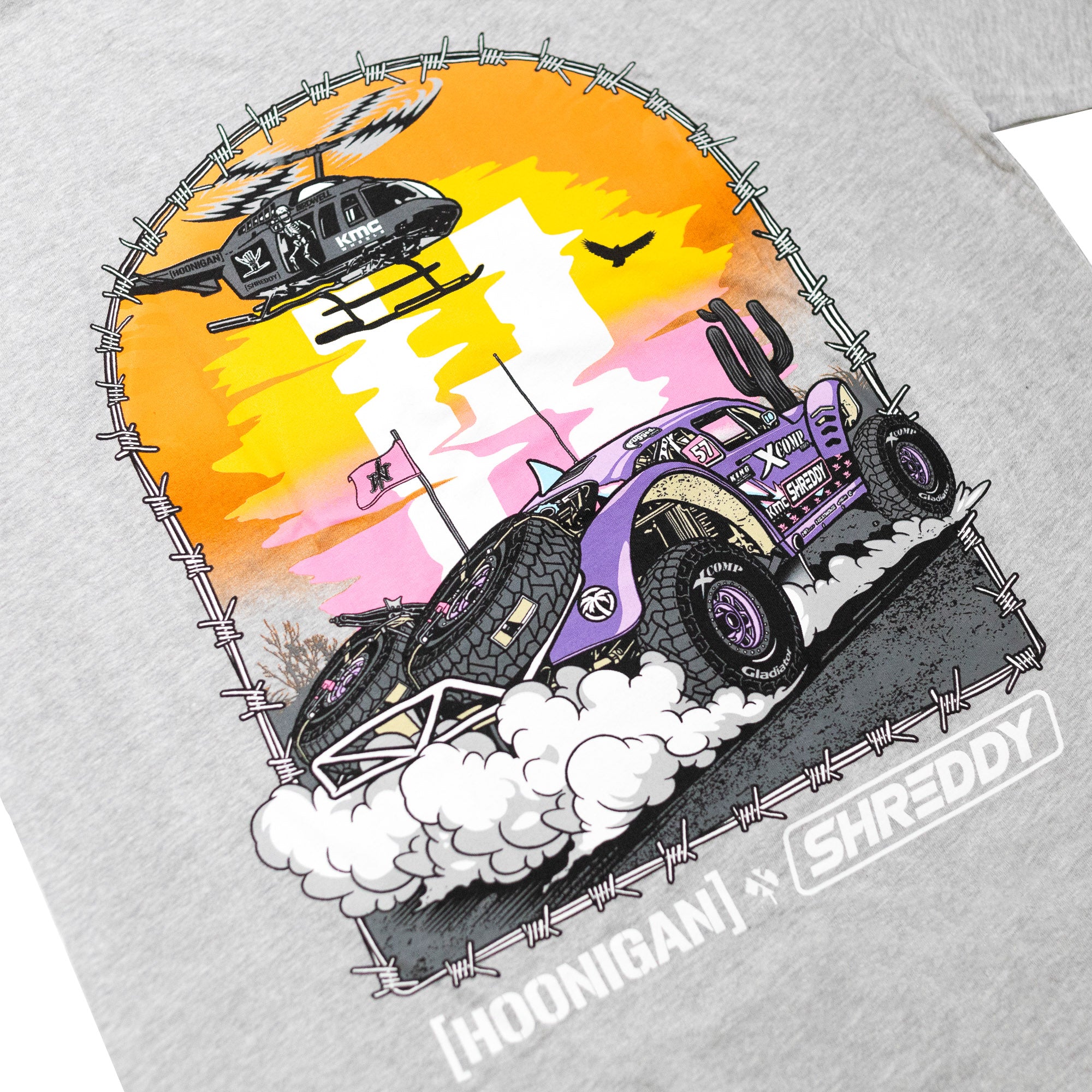 Hoonigan x Shreddy Desert Shred short sleeve t-shirt featuring a vibrant graphic of a desert car and helicopter.