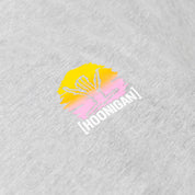 Hoonigan x Shreddy Desert Shred short sleeve t-shirt featuring a vibrant sunset graphic and logo on a light gray background.