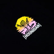Black short sleeve t-shirt featuring a colorful Hoonigan x Shreddy graphic of a hand and sunset design.