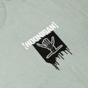 Light green short sleeve t-shirt featuring a bold Hoonigan logo with a dripping graphic design.