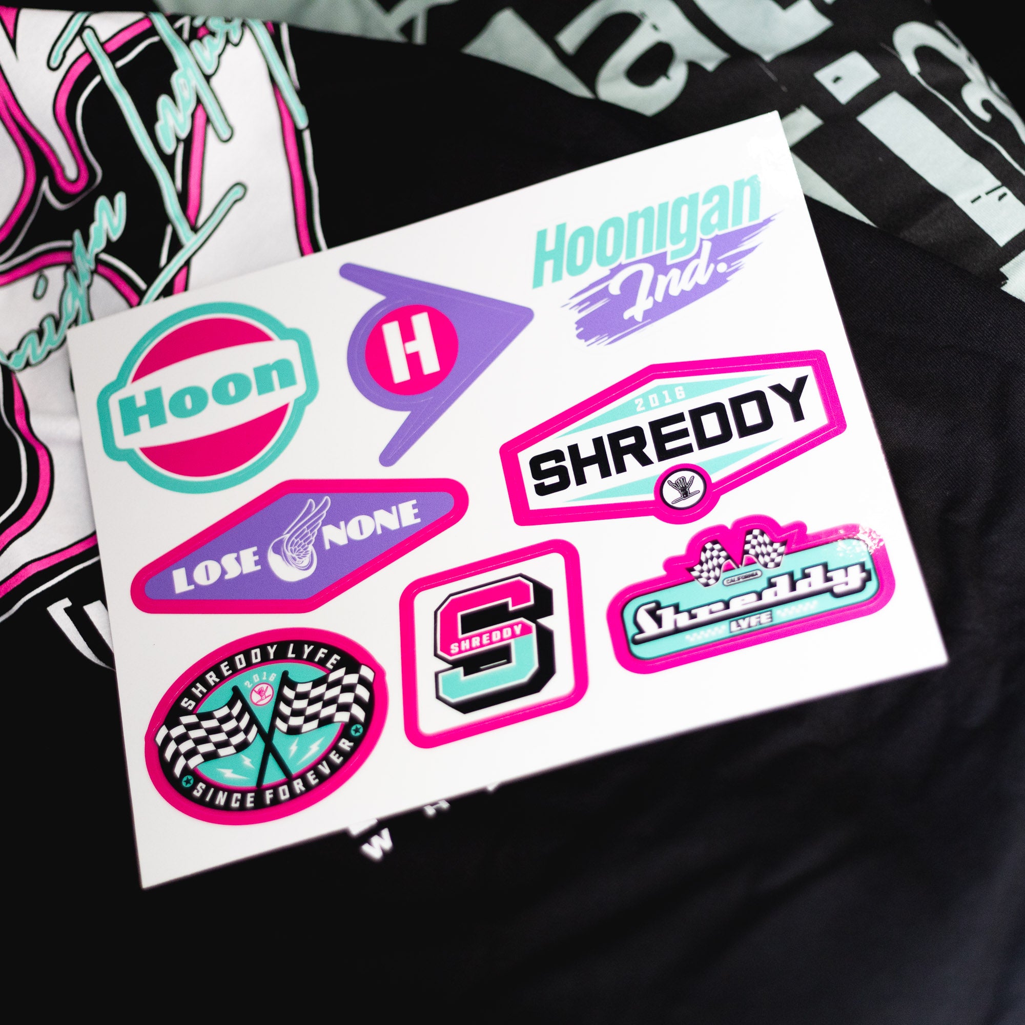 Hoonigan x Shreddy sticker sheet featuring vibrant automotive-themed designs for car culture enthusiasts.