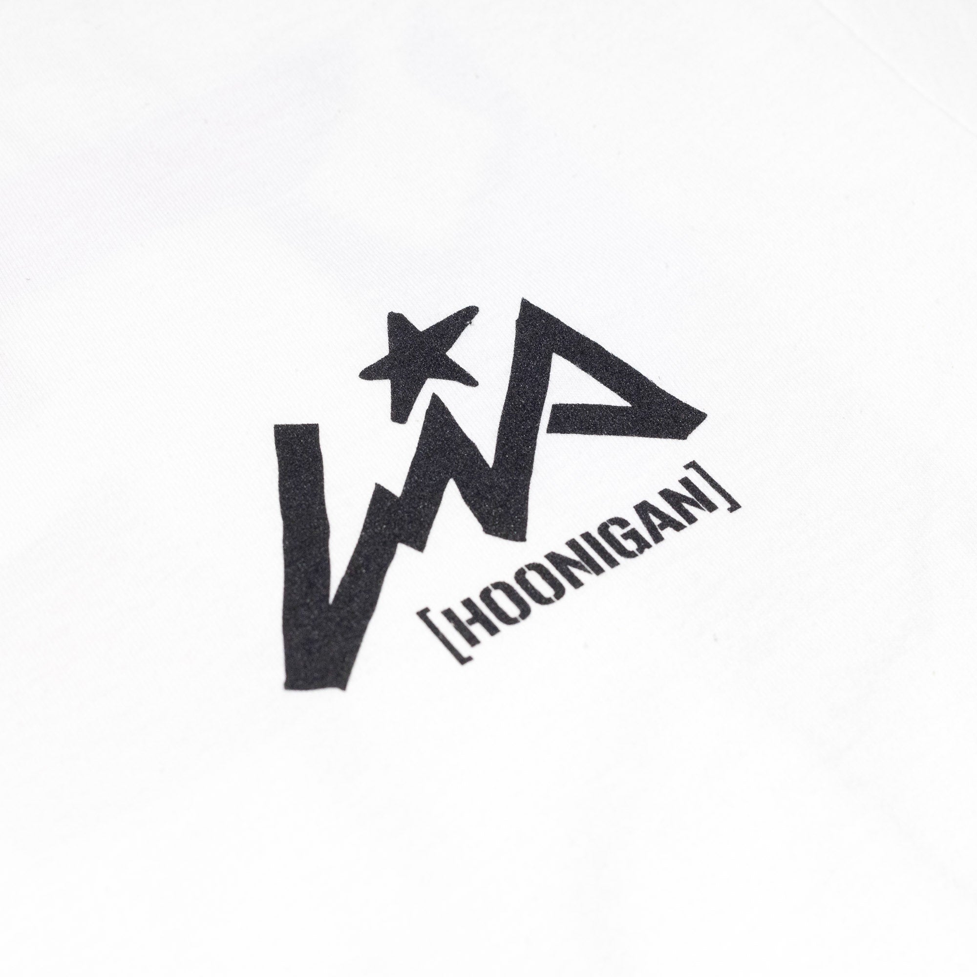 Hoonigan x Lia Block H BOX short sleeve t-shirt featuring a bold black logo on a white fabric background.