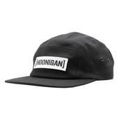Black unstructured strapback hat featuring a prominent embroidered Hoonigan logo on the front. Ideal for motorsport enthusiasts.