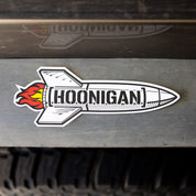 Hoonigan ROCKET sticker featuring a stylized rocket with flames, designed for automotive enthusiasts.