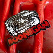 Hoonigan DOUBLE FEATURE sticker featuring classic muscle cars with bold graphics, perfect for automotive enthusiasts.