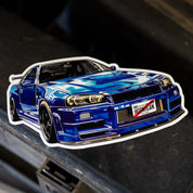 Hoonigan KING OF MONSTERS sticker featuring a detailed blue sports car design, perfect for automotive enthusiasts.