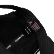 Black Hoonigan PATRIOT Snapback Hat featuring a cotton fabric and branded interior tags for motorsport enthusiasts.