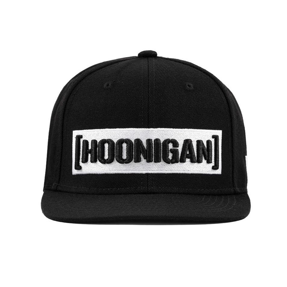 Hoonigan CENSOR BAR Snapback Hat in black and white, featuring bold logo on front, adjustable snap closure, and flat brim design.
