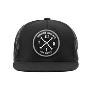 Hoonigan HITS v2 trucker hat in black and gray with a mesh back and logo patch on the front.