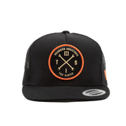 Hoonigan HITS v2 black and orange trucker hat with mesh back and embroidered logo.