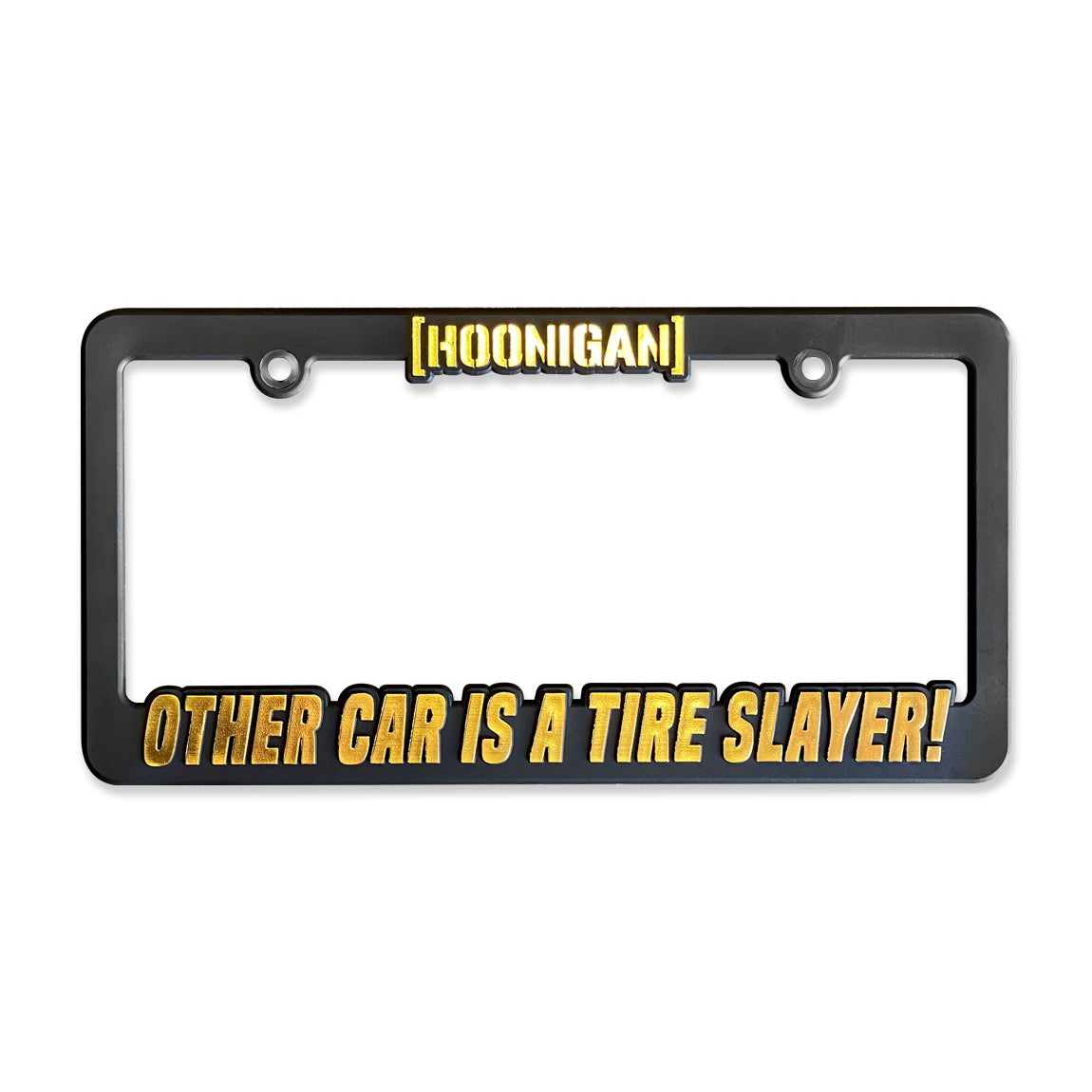 Black license plate frame featuring "OTHER CAR IS A TIRE SLAYER!" in bold gold lettering, perfect for car enthusiasts.
