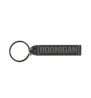 Hoonigan CENSOR BAR rubber keychain in black and gray, featuring bold logo design.