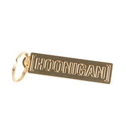 Gold metal keychain featuring the Hoonigan logo, perfect for automotive enthusiasts and car culture fans.