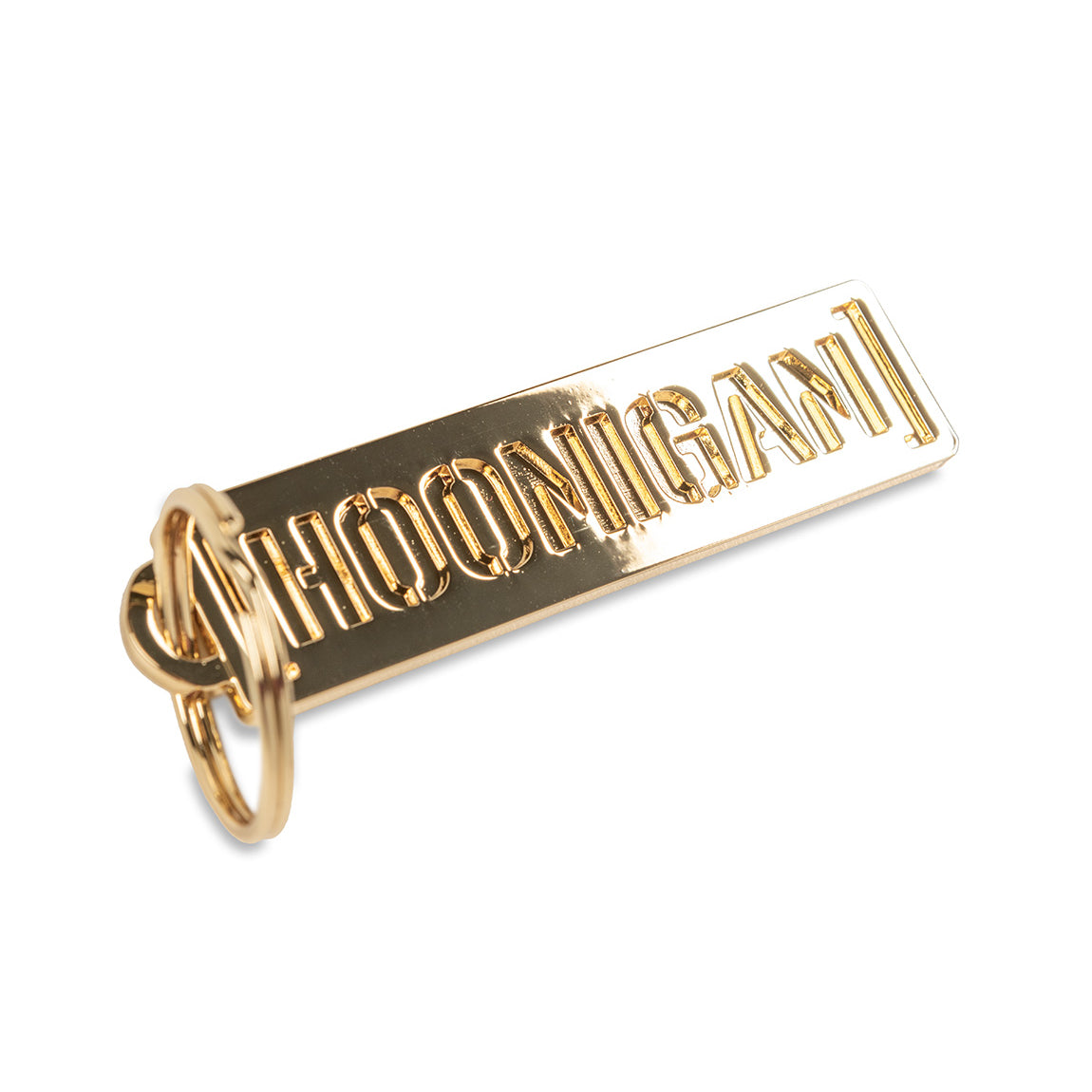 Gold Hoonigan metal keychain featuring a bold logo design, perfect for automotive enthusiasts and car culture fans.