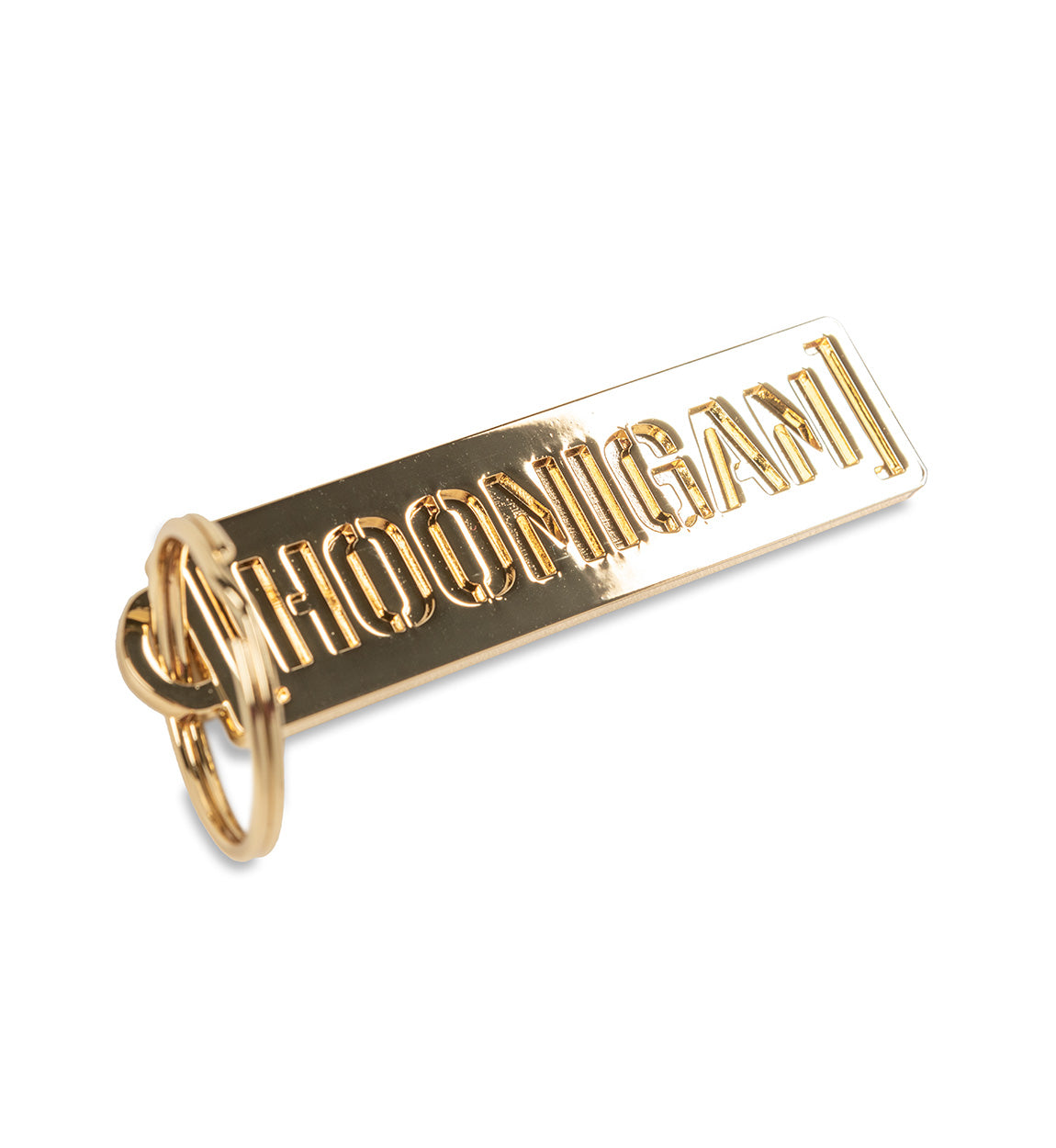 Gold Hoonigan metal keychain featuring a bold logo design, perfect for automotive enthusiasts and car culture fans.