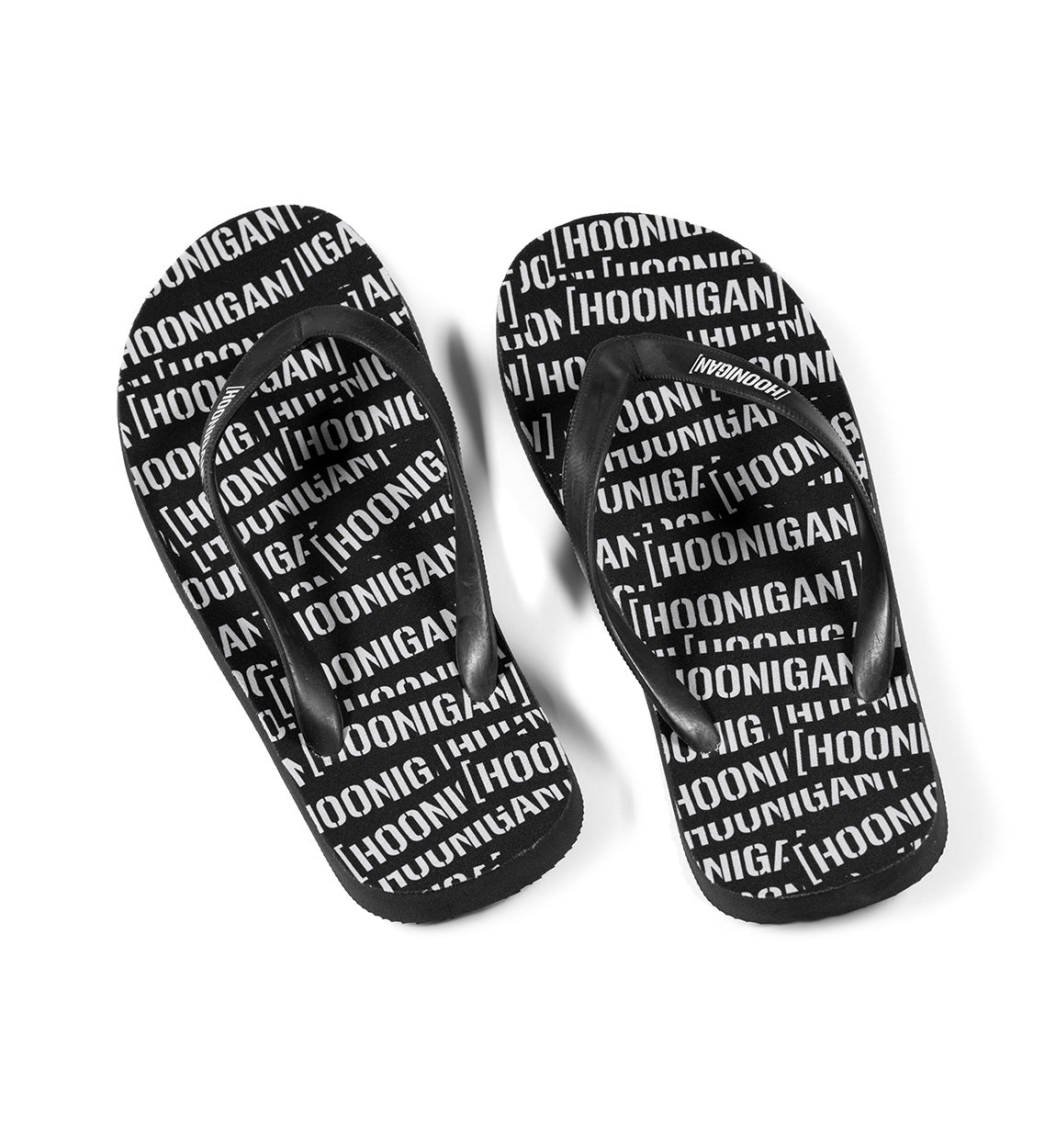 Hoonigan SCATTER flip flops with a black and gray design featuring a bold logo on the footbed.