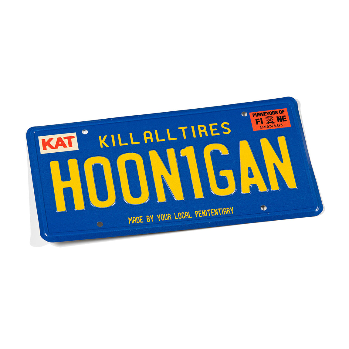Hoonigan CALI OG metal license plate in blue with white graphic design, featuring the Hoonigan logo and "CALI OG" text.