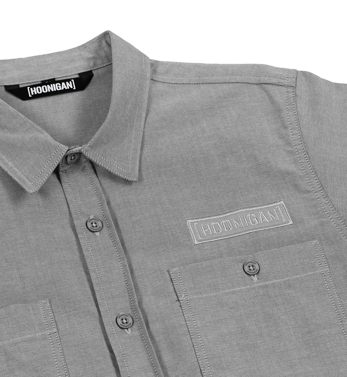 Hoonigan DONUT GARAGE woven short sleeve button-up shirt in heather gray with a subtle logo print.