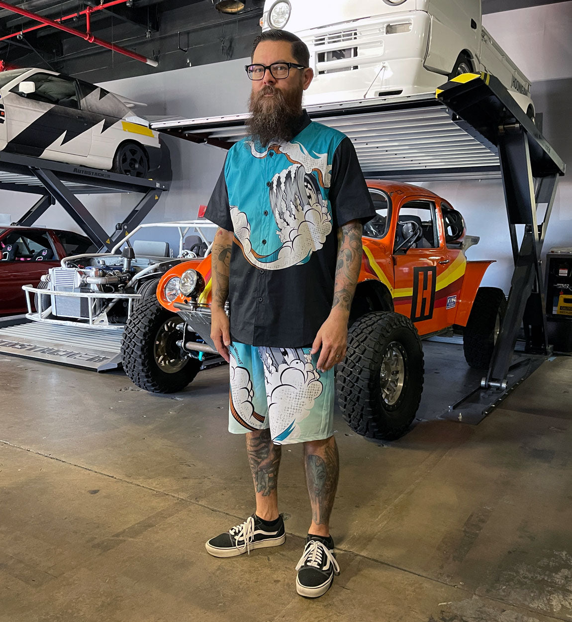 Hoonigan WAVE OF MUTILATION black woven short sleeve button-up shirt featuring a unique graphic design.