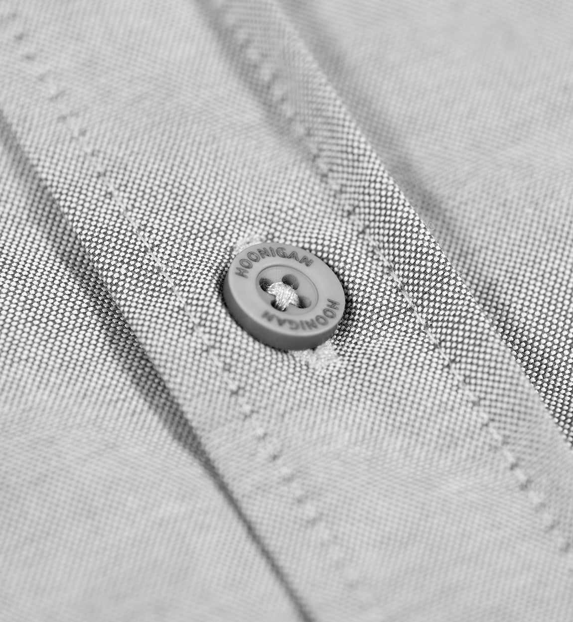 Hoonigan DONUT GARAGE Woven Long Sleeve Button-up Shirt in heather gray, featuring a logo design on the chest and a casual style.