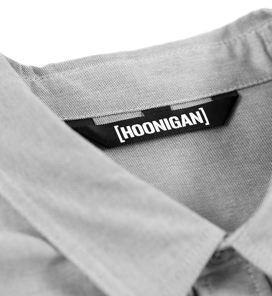 Hoonigan DONUT GARAGE Woven Long Sleeve Button-up Shirt in gray, featuring a stylish design with a button-up front and a casual fit.