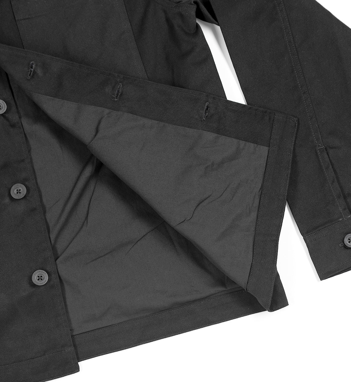 Hoonigan CHORE Jacket in black, featuring a front pocket and branded logo.