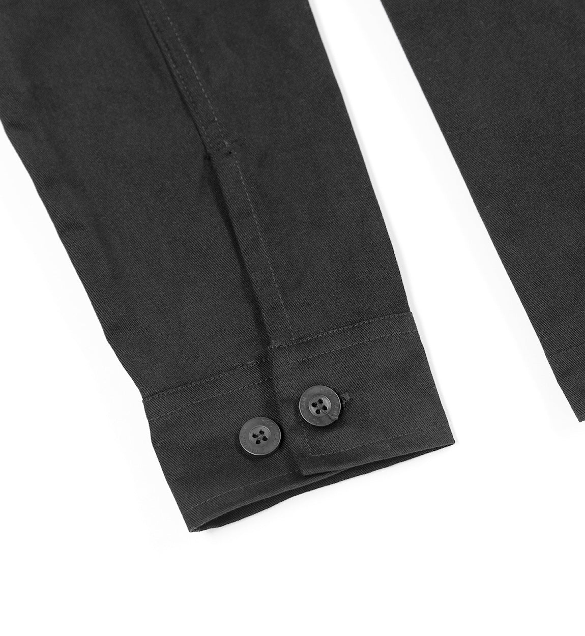 Hoonigan CHORE Jacket in black, featuring a layered design with chest pockets and logo detailing.