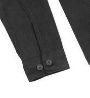 Hoonigan CHORE Jacket in black, featuring a layered design with chest pockets and logo detailing.