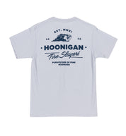 Hoonigan CHEATER SLICKS Short Sleeve Tee featuring a graphic design with a racing-themed print on a light blue background.