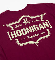 Short sleeve Hoonigan EMBLEM tee in burgundy with front logo print.