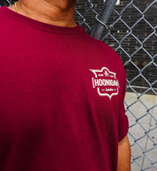 Hoonigan EMBLEM Short Sleeve Tee in burgundy, featuring bold white logo design on the front.
