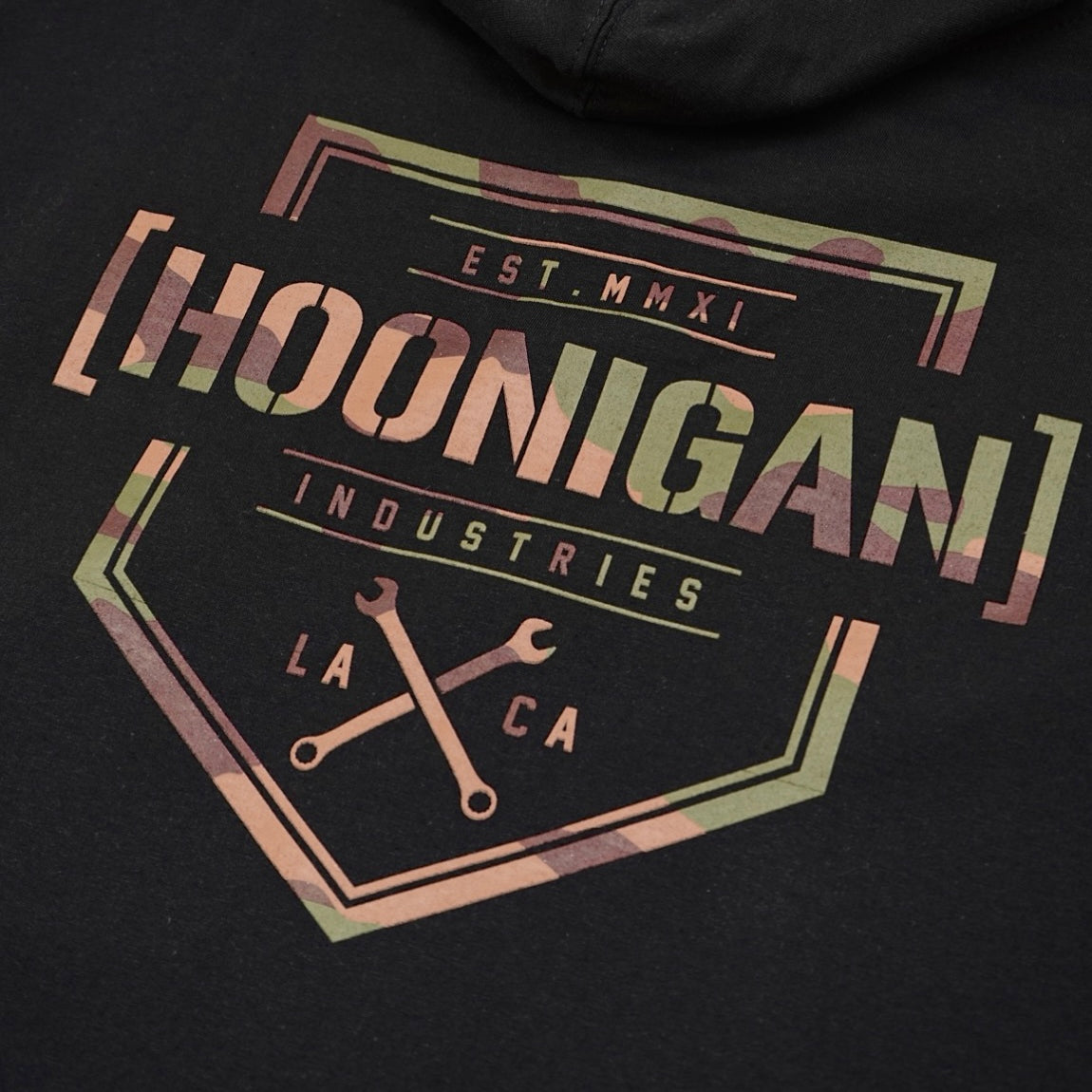 Hoonigan Covert Camo Bracket X Logo Zip Hoodie in black with camouflage pattern.