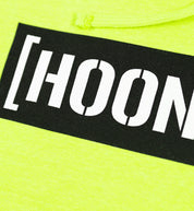Hoonigan CENSOR BAR pullover hoodie in yellow with white logo on front, featuring a classic hood and kangaroo pocket.