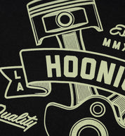 Black Hoonigan CRANKED pullover hoodie featuring a bold graphic logo on the front, with drawstring hood and kangaroo pocket.