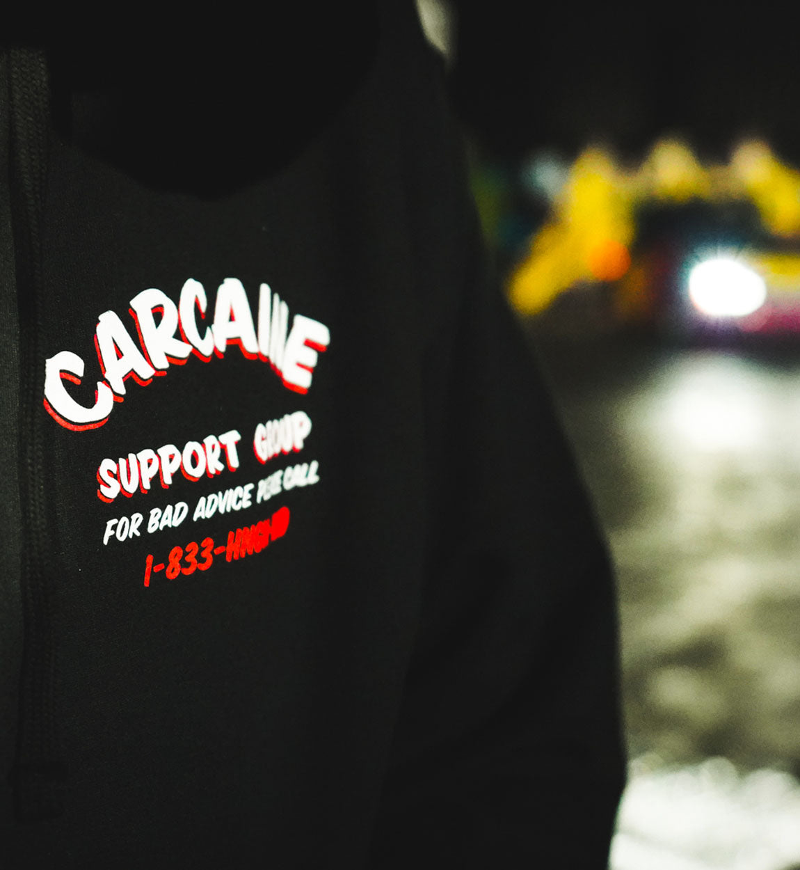 Hoonigan CARCAINE SUPPORT GROUP pullover hoodie in black with white graphic text design.