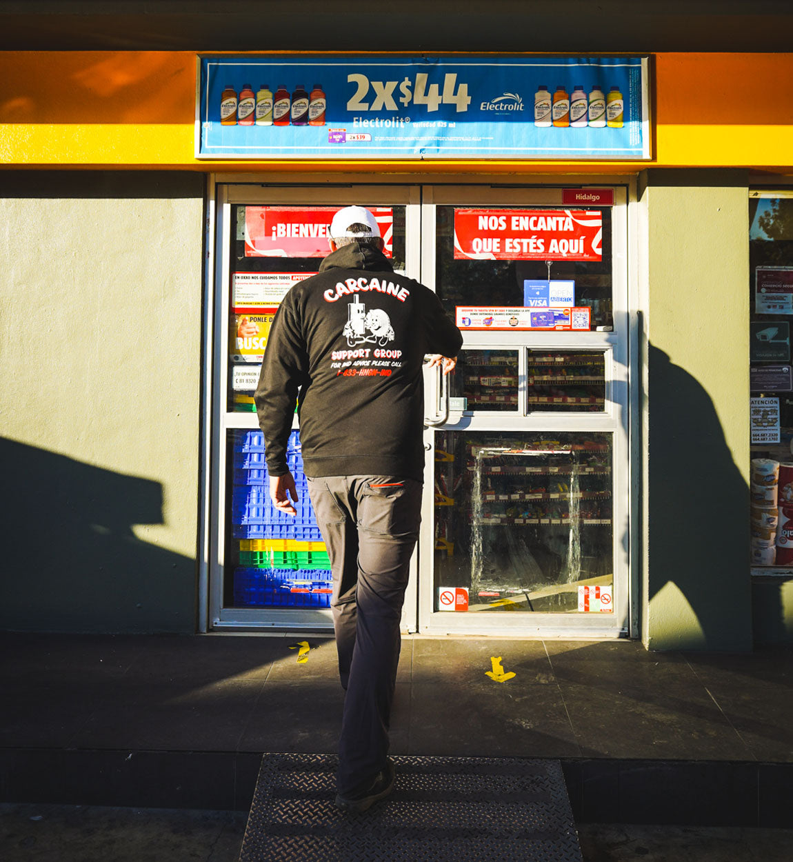 Hoonigan CARCAINE SUPPORT GROUP black pullover hoodie with white logo and graphic design.