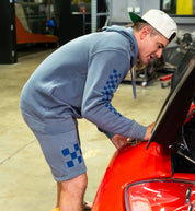 Hoonigan Tire Slayer Summer Camp shorts featured in a stylish black design with a bold logo on the left leg.