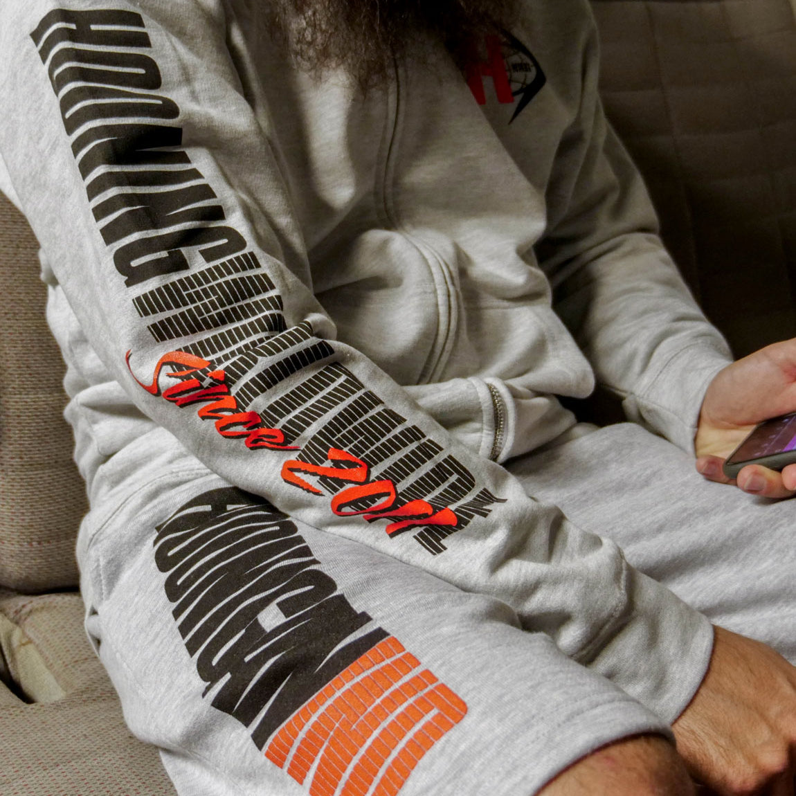 Hoonigan WORLDWIDE gray fleece shorts with logo detailing and drawstring waistband.