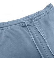 Hoonigan TIRE SLAYER SUMMER CAMP Shorts featuring a relaxed fit, vibrant graphic design, and versatile pockets.